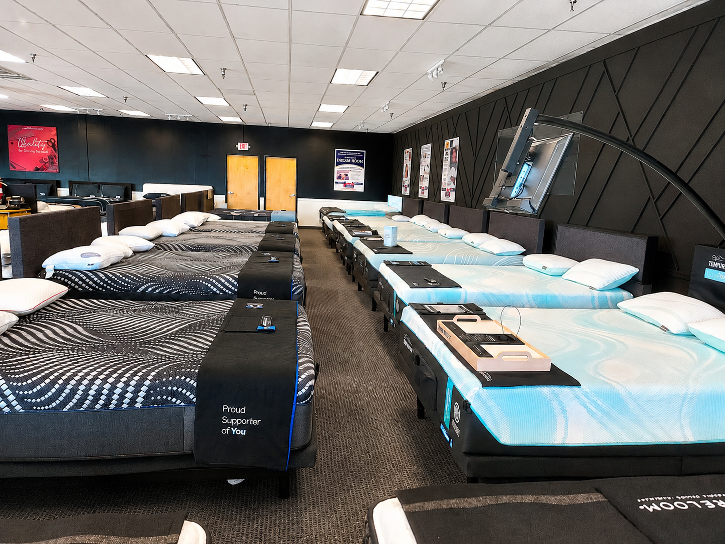 Interior of the Bed DRS North Scottsdale showroom with rows of premium mattresses on display